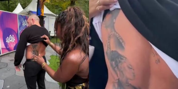 Tems Lifts Shirt of White Male Fan Who Tattooed Her Face on His Back
