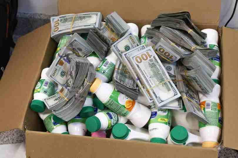 ABUJA AIRPORT: Customs Intercepts $193,000 Hidden in Yoghurt Carton