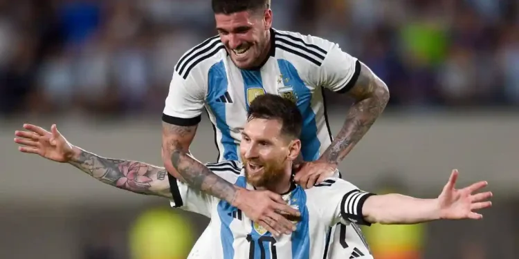 Rodrigo De Paul and Lionel Messi