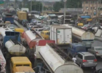 Major Traffic Disruption After Container Truck Turned on Otedola Bridge