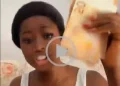 Nigerian Woman Based In Italy Flaunts Cash Earned From Sex Work In Viral Video