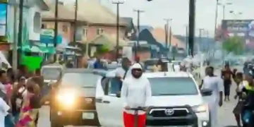 Olu of Warri Inspects Coronation Anniversary Preparations on Electric Scooter
